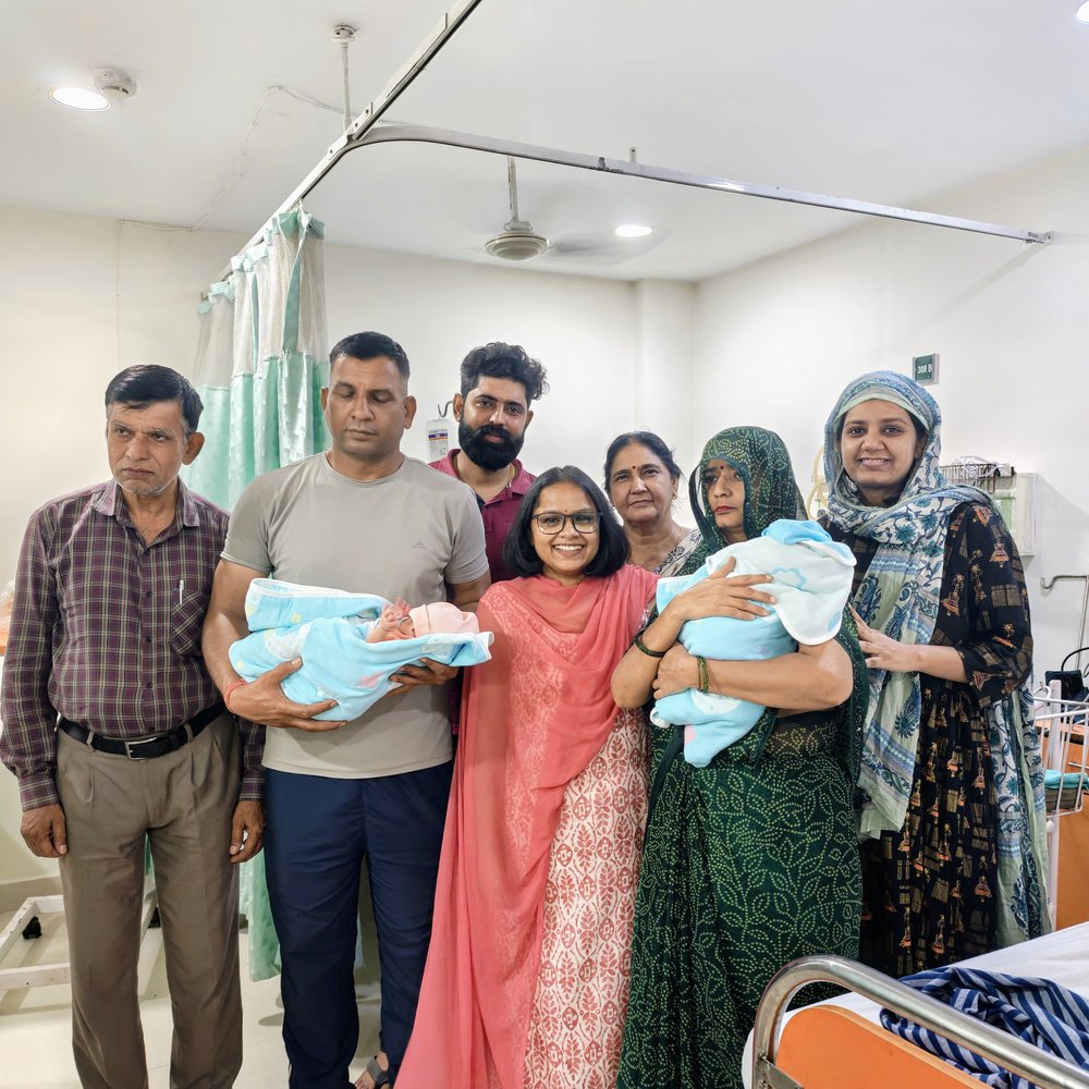 Dr. Anam Ghani with a family and their newborn twins at the Sector 51 women's health clinic, Gurugram